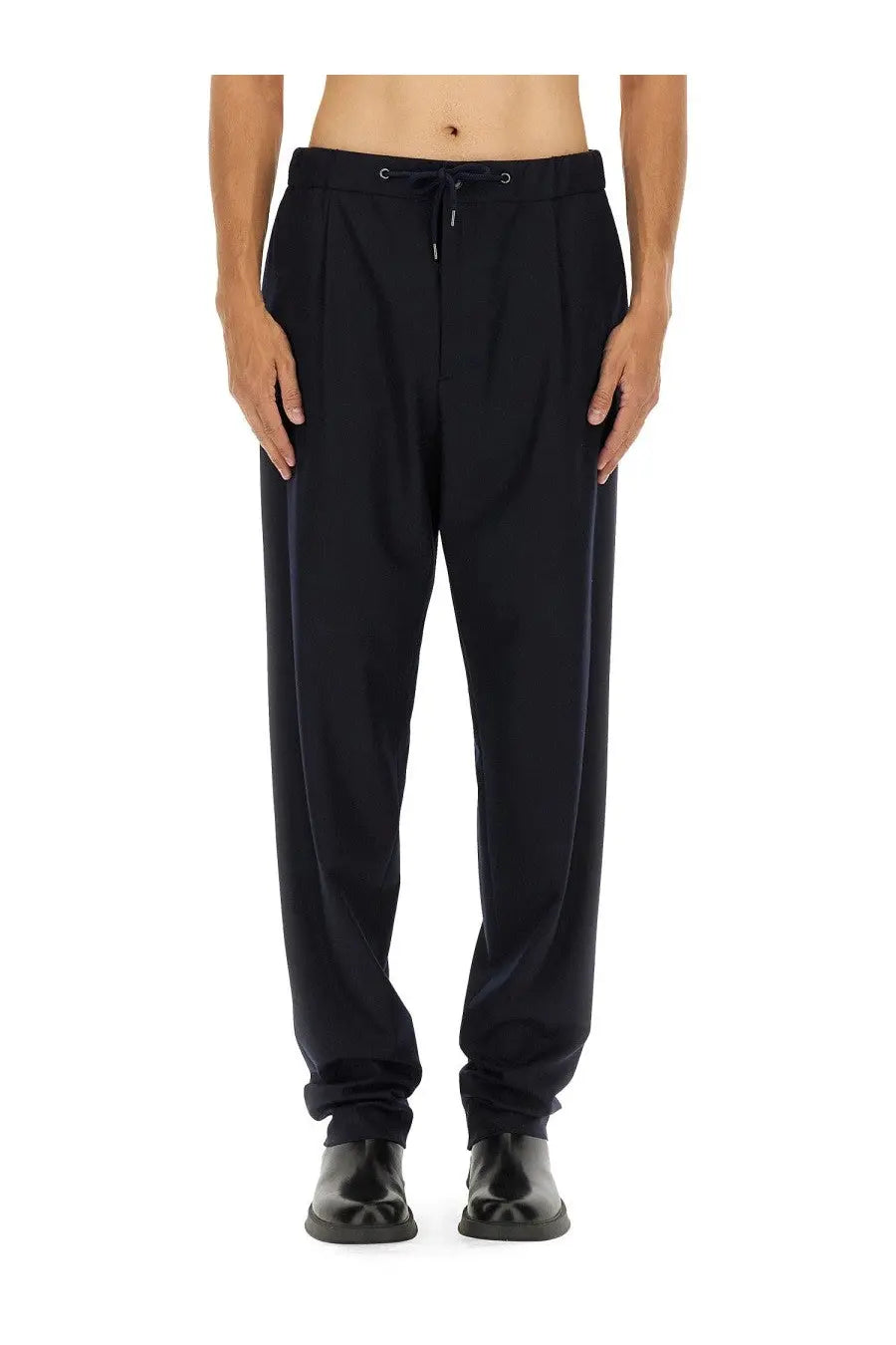 Black pleated trousers with drawstring waistband and tapered legs in cashmere by Giorgio Armani menswear