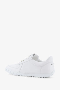 Givenchy men’s glide runner white leather sneaker with textured rubber sole and subtle stitching details