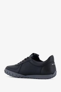 Black givenchy men’s leather sneaker with sleek minimalist design and subtle branding on the heel back side