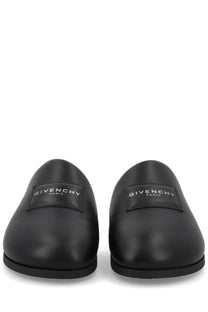 Givenchy men’s mule puffy black loafers with sleek polished leather and minimalist branding on the vamp