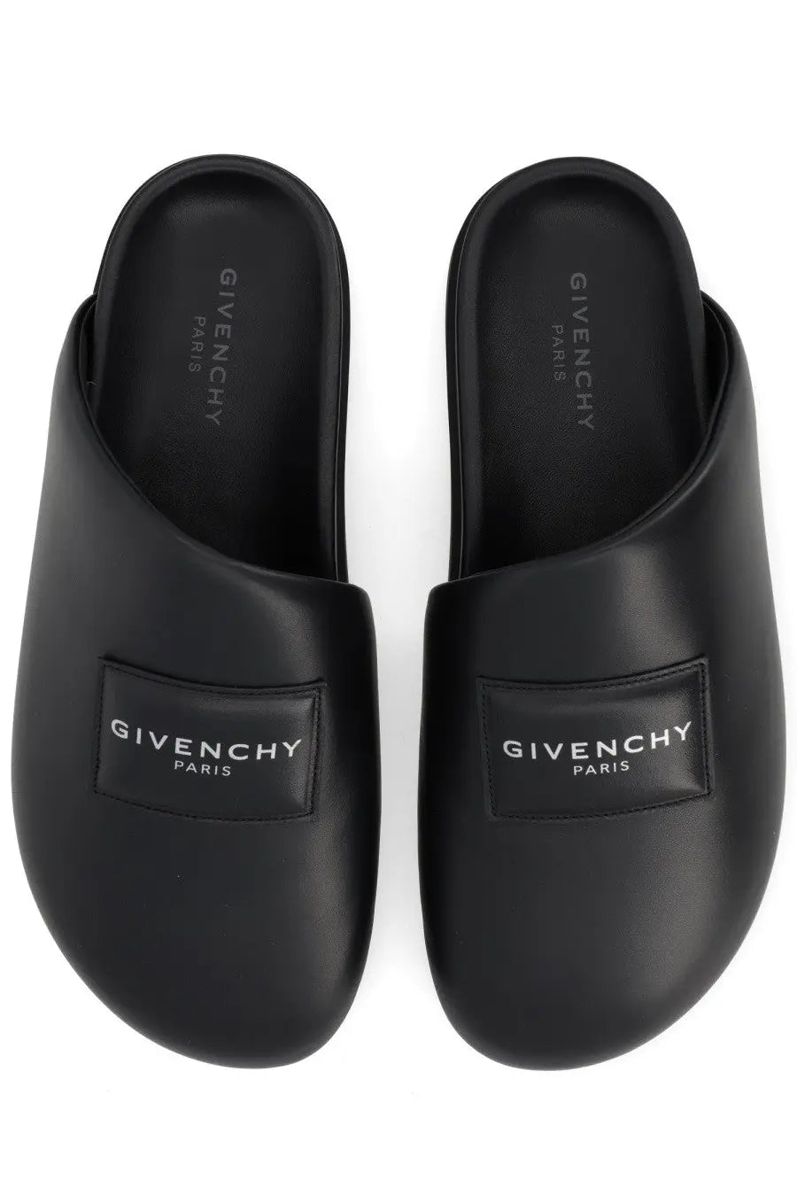 Black Givenchy Paris men’s mule puffy slip-on sandals with sleek minimalist design and embossed logo patches