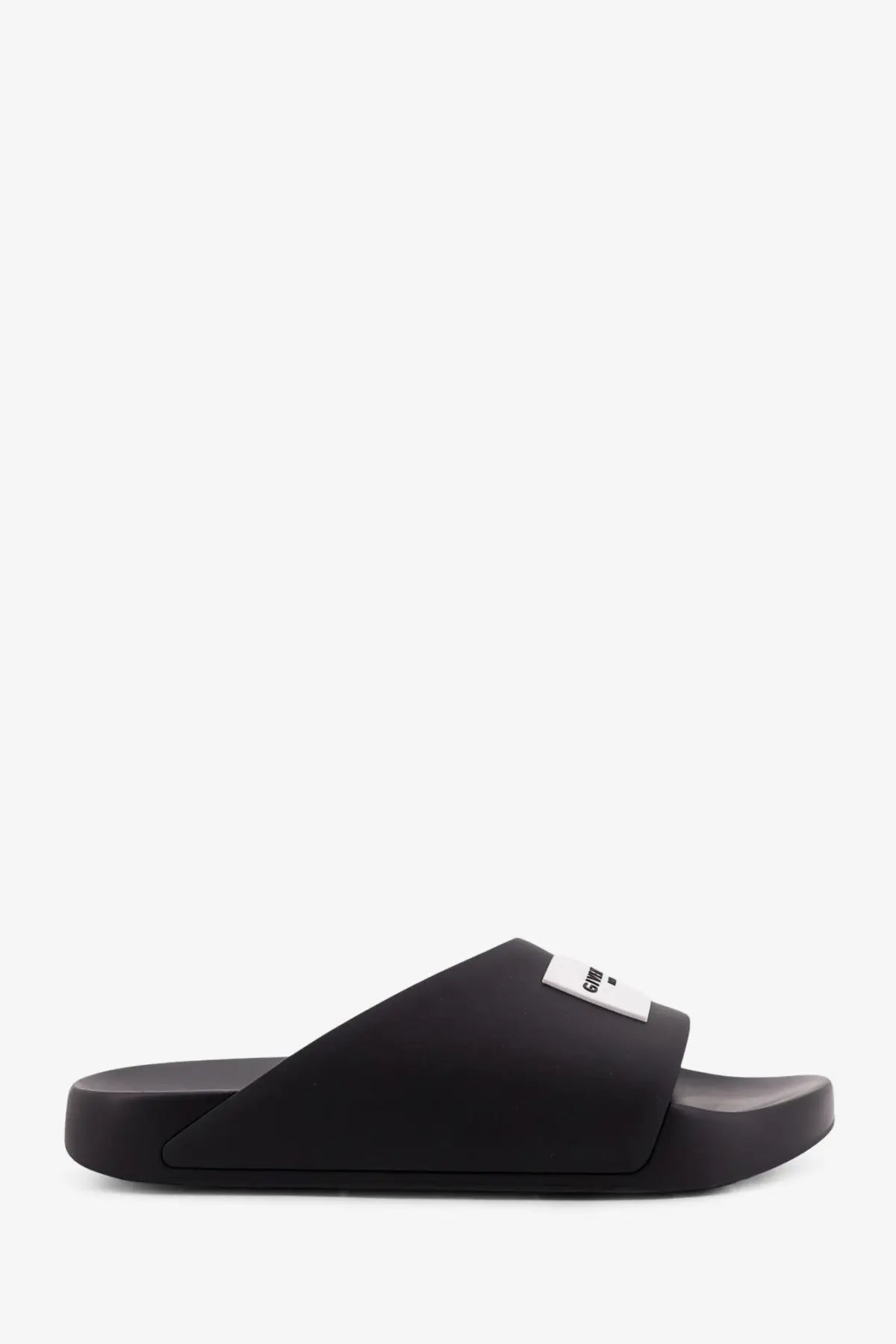 Givenchy men’s black rubber slide sandal with minimalist design and small white label on the strap