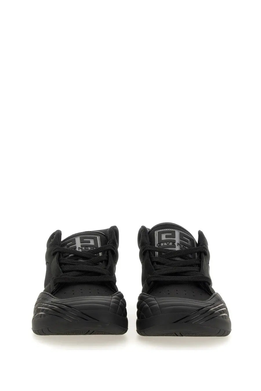 Givenchy men’s skate sneaker black with chunky sole textured upper and contrasting silver logo patch at the heel back view