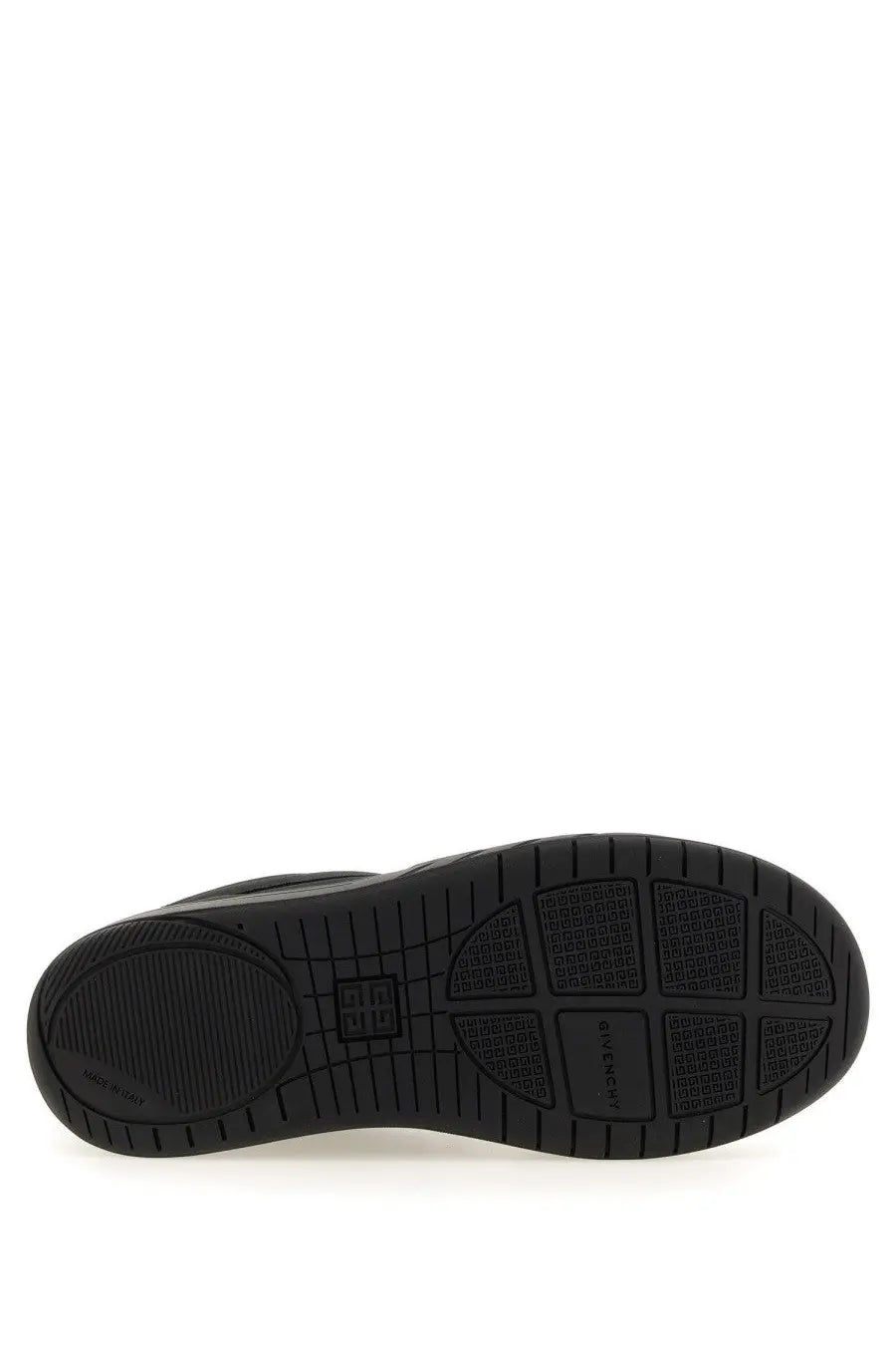 Black rubber sole of givenchy men’s skate sneaker with embossed logo pattern and textured grip design