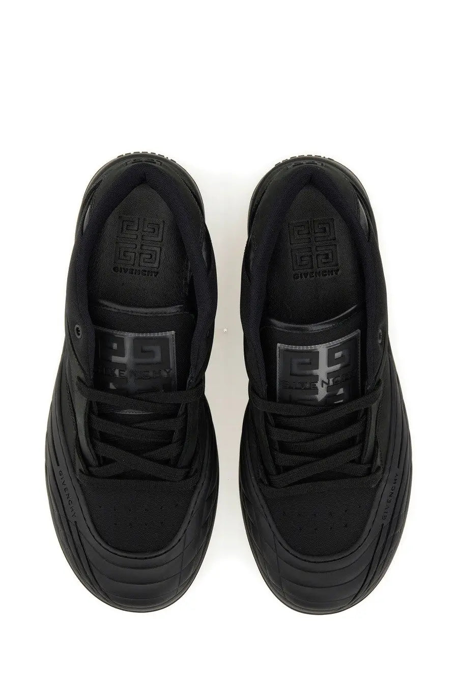 Givenchy men’s skate sneaker black with sleek matte finish and logo detailing on tongue and heel