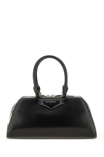 Black Givenchy women’s Antigona East West bag small with glossy leather finish and structured rounded silhouette