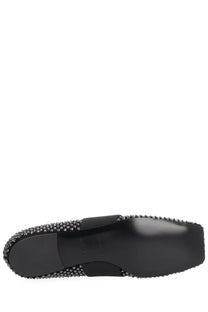 Givenchy women’s ballerina con patch black flat shoe with sleek glossy finish and sparkling silver stud border