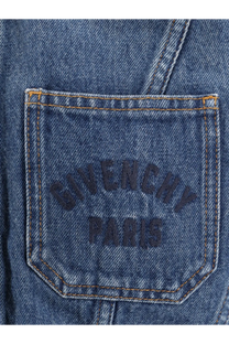 Blue denim pocket of Givenchy women’s denim jacket featuring dark blue embroidered logo and tan contrasting stitching