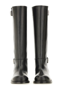 Givenchy women’s flat boot Voyou black black patent leather knee-high boots with silver-toned buckle accents