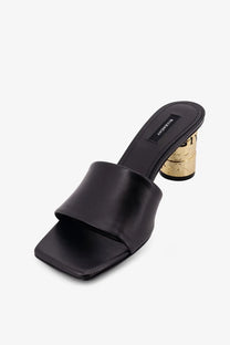 Givenchy women’s black leather mule sandals with gold-toned textured block heel and logo on insole