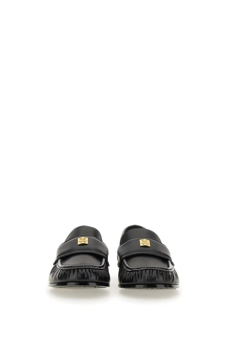 Givenchy women’s black leather moccasin loafers with gold-tone logo plaque and frayed detailing