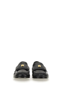 Givenchy women’s black leather moccasin loafers with gold-tone logo plaque and frayed detailing