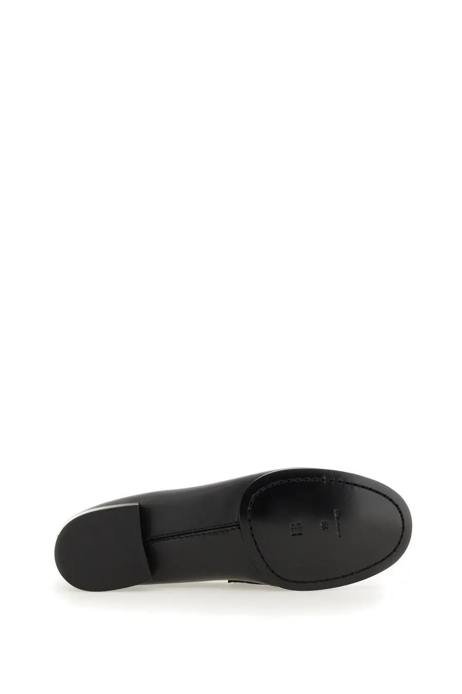 Givenchy women’s moccasin black patent leather shoe with low block heel and rounded toe shown from the back side