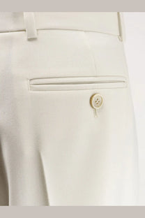 Cream-colored Givenchy women’s tailored wool and mohair trousers with subtle woven texture and matching button closure