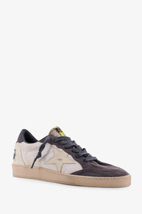 Golden Goose men’s Ballstar low-top sneaker in beige suede and dark gray leather with gold star patch detail