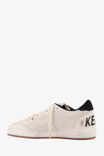 Golden Goose men’s HF Ball Star cream perforated leather sneaker with black heel tab and ke branding on the side