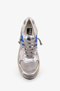 Golden Goose men’s white mesh and leather sneakers with silver and blue distressed dad sneaker design and metallic accents