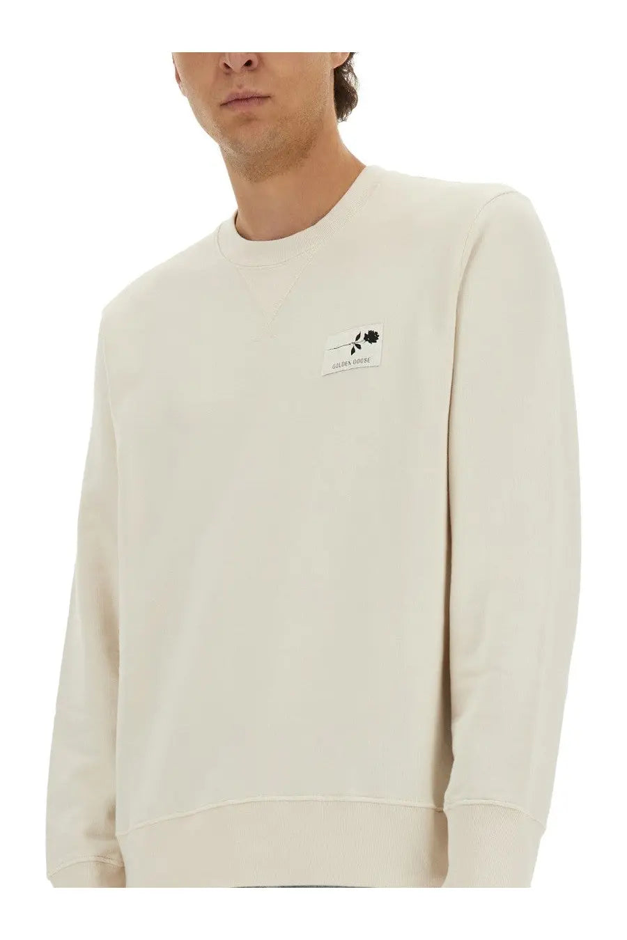 Cream-colored cotton sweatshirt with a small black rose patch on the left chest by Golden Goose men’s regular fit