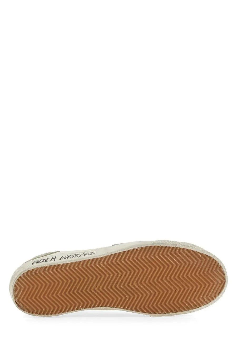 Back view of golden goose men’s sneaker superstar white canvas with tan rubber herringbone sole and black logo heel