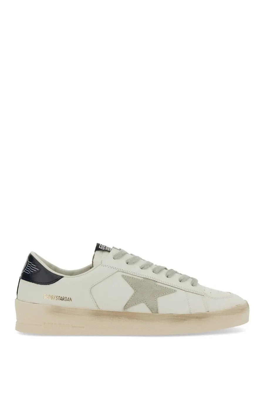 White leather golden goose men’s stardan sneaker with gray star emblem and black heel tab