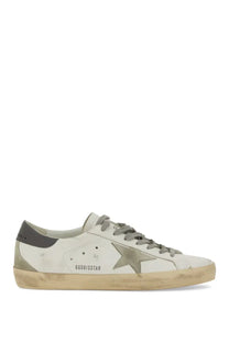Golden Goose Mens Super Star white leather sneaker with faded metallic star