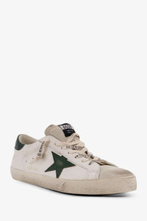 Golden Goose men’s superstar leather sneakers white with dark green star emblem and distressed texture