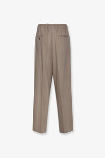 Beige pinstripe golden goose men’s wool blend trousers roasted cashew with elastic waistband and two rear pockets back view