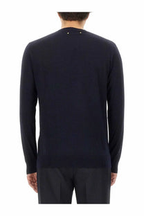 Dark navy wool knit sweater with long sleeves and gold star embellishments at neckline by Golden Goose men’s jersey