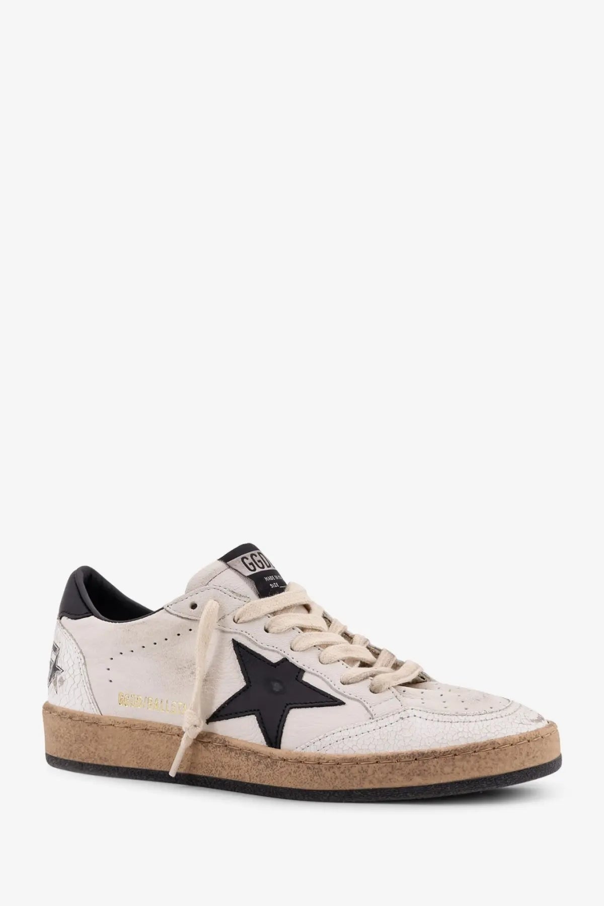 Golden Goose women’s ball star vintage white leather sneaker with black star emblem beige laces and cork-textured sole