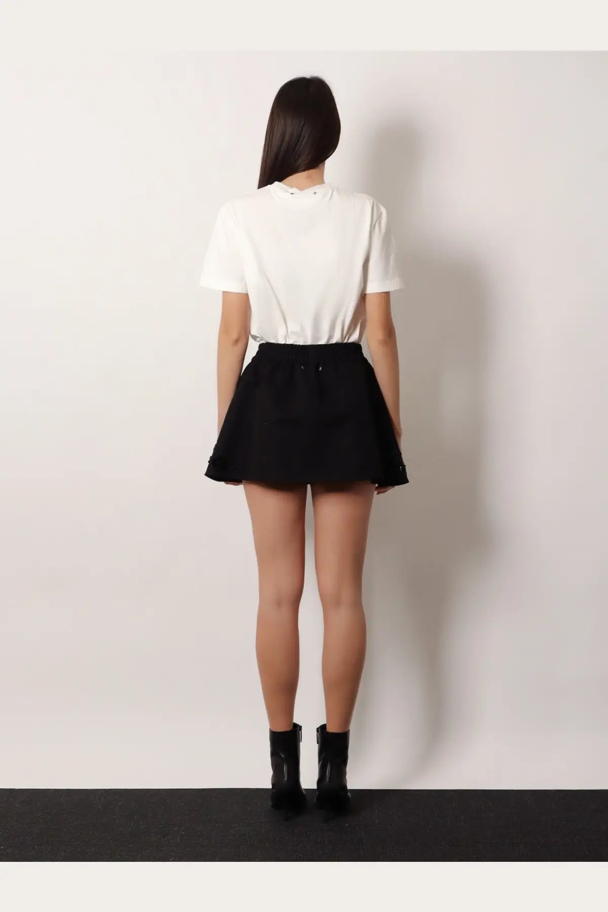 Black pleated mini skirt with elastic waistband made from cotton blend by Golden Goose women’s collection