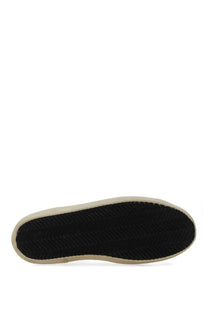 Golden goose women’s hi star sneaker white with black rubber sole herringbone tread and beige sidewall shown from back