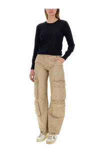 Beige cargo pants with multiple flap pockets and relaxed wide-leg cut paired with golden goose blue shirt