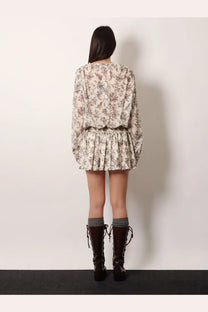 Golden Goose women’s short cotton dress in black with a soft beige floral print long sleeves and flared skirt