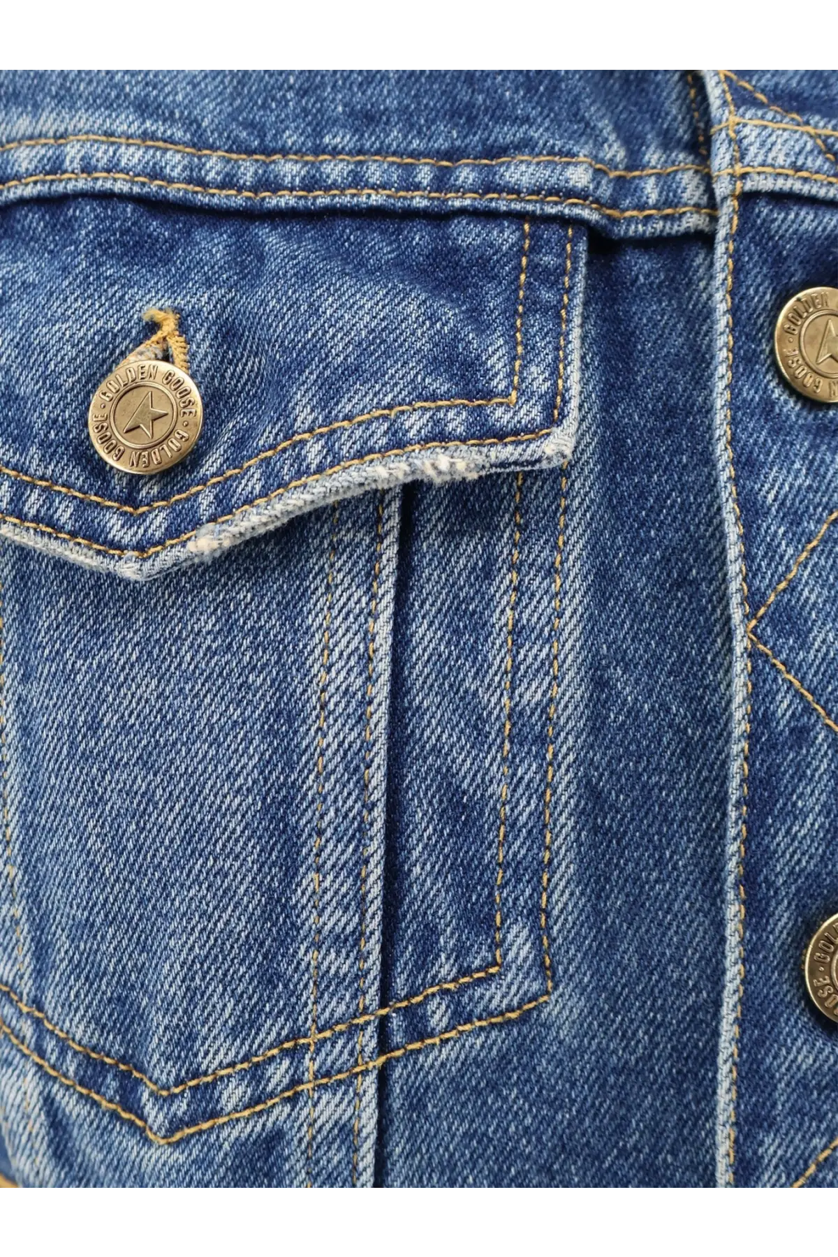 Golden Goose women’s slim fit blue denim jacket with gold-toned star emblem buttons and silver cross text detailing