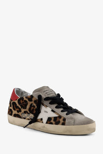 Golden Goose womens super star sneaker white leopard-print suede with white star patch black laces and red heel tab