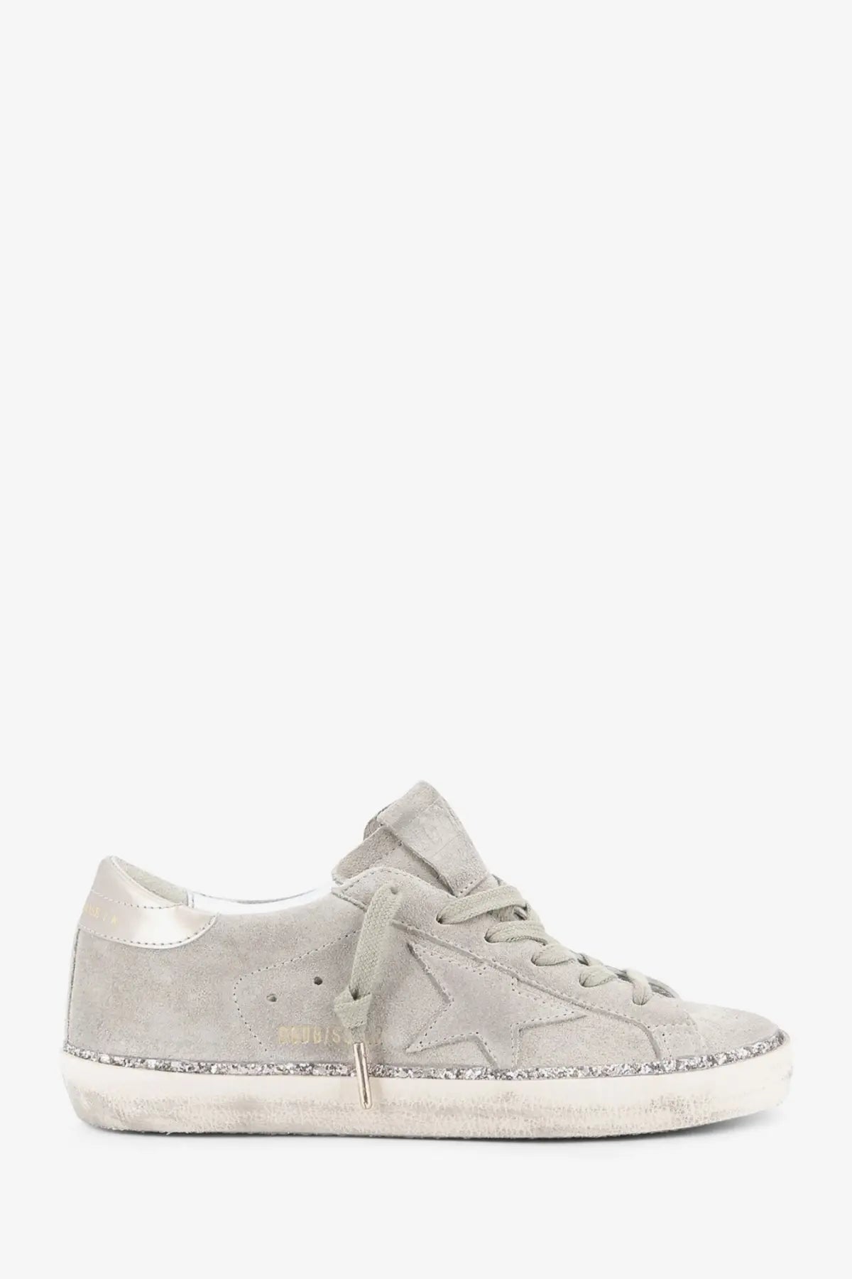 Golden Goose women’s super star beige suede sneaker with light gray star emblem and glittery sole trim