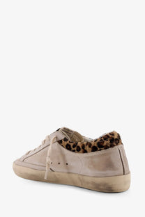 Golden Goose women’s super star white beige suede low-top sneaker with leopard-print fur collar and distressed sole