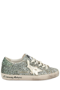 Golden Goose women’s Superstar sneaker silver glittery silver and green low-top with metallic star emblem on side