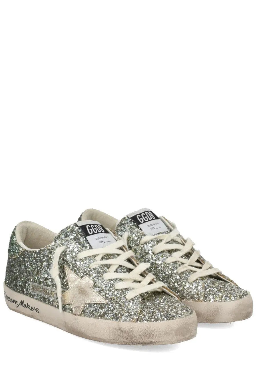 Golden Goose women’s Superstar sneaker in silver glitter with white laces and distressed rubber sole