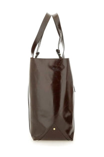 Golden Goose women’s tote bag in dark brown glossy leather with structured handles and gold-tone accent at the base