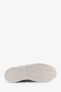 White rubber sole with geometric greek key pattern and loco logo on gucci men’s ace supreme gg fabric low top sneakers brown