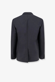 Black tailored blazer with sleek structured silhouette and subtle seam detailing from gucci mens classic mohair and wool suit blitz