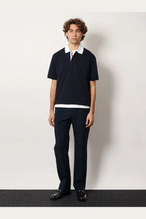 Gucci men’s navy blue cotton piquet polo shirt with white collar and hem featuring striped placket detail