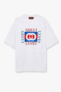 White gucci men’s cotton oversized t-shirt with bold red white and blue logo print and vertical brand name design