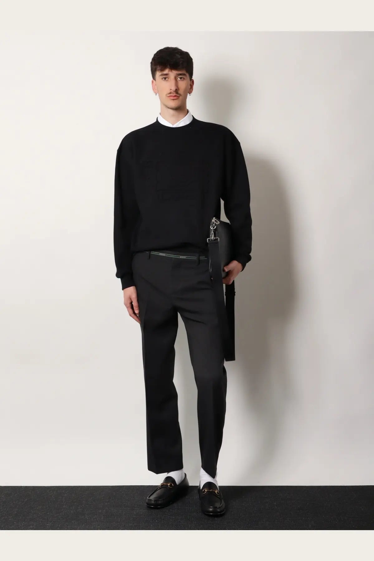 Gucci men’s black cotton sweatshirt featuring a black woolen sweater with ribbed cuffs and hem over a white shirt