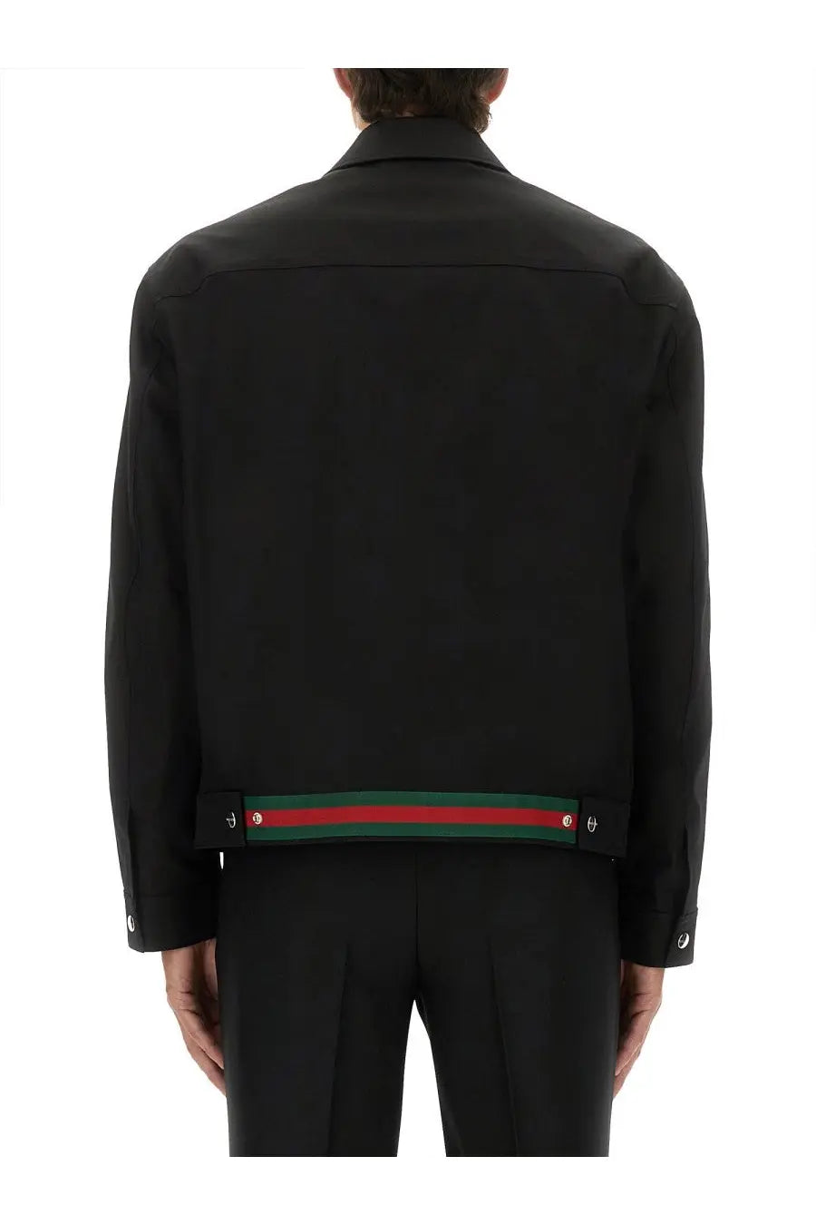 Black gucci men’s cotton twill jacket featuring a distinctive red and green striped band at the hem