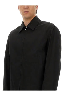 Gucci men’s black cotton twill zip-front jacket with structured collar and subtle stitching details