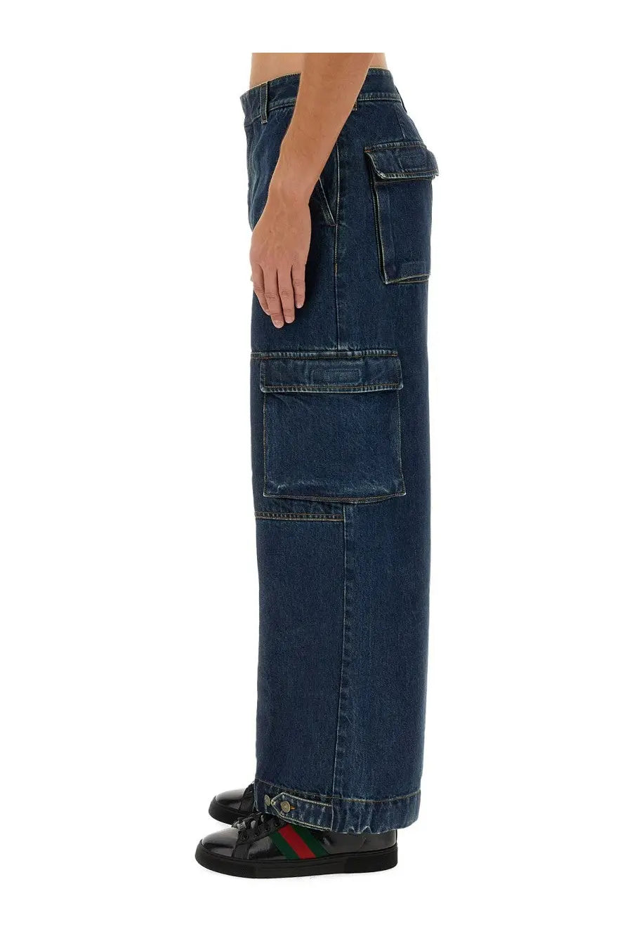 Gucci men’s dark blue denim cargo pants with multiple large pockets and rolled cuff detail