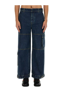 Gucci men’s blue denim cargo pants with wide legs and multiple pockets in dark blue fabric