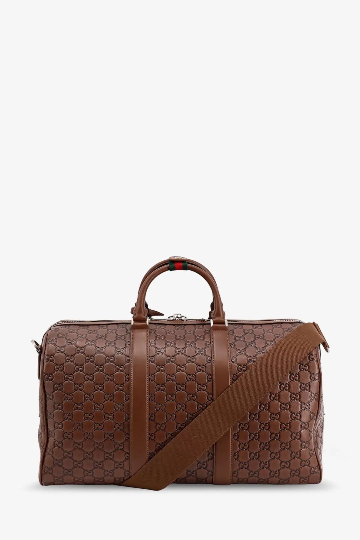 Brown gucci gg supreme leather duffle bag with matching shoulder strap and top handle for men in black